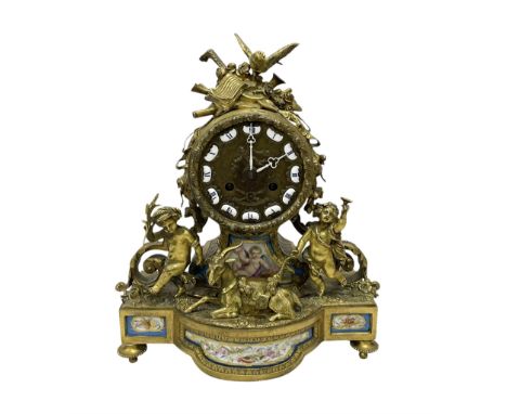 French mid-19th century gilt/brass 8-day mantle clock, with a sculpted depiction of the Goat Amalthea with the Infant Jupiter