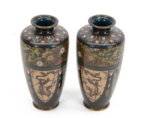 Pair of Japanese Meiji period cloisonne vases, of baluster form, decorated with dragons, exotic birds and flowers, upon circu