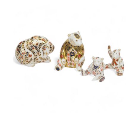 Four Royal Crown Derby paperweights, comprising Russian Bear with gold stopper and original box, Imari pattern Honey Bear wit