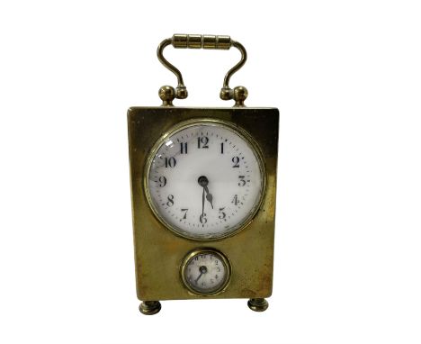 French - petite early 20th century French brass cased travelling alarm clock, with bun feet and carrying handle, circular ena