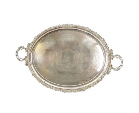 Large Victorian silver plated twin handled serving tray, of oval form with foliate and acanthus cast rim, the centre chased w