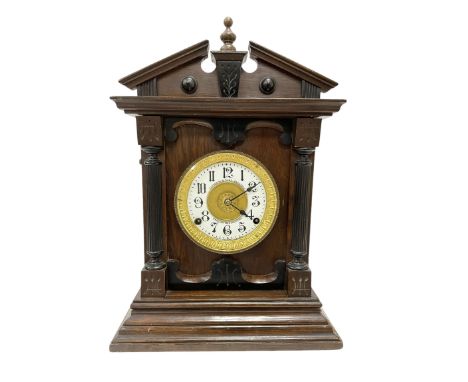 Fattorini of Bradford - oak cased early 20th century mantle clock with alarm, rectangular case with a broken pediment, turned