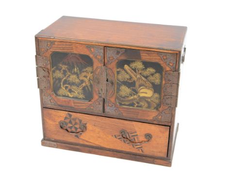 Mid 20th century Japanese mahogany jewellery box, the doors with embossed copper panels, with one long parquetry inlaid drawe