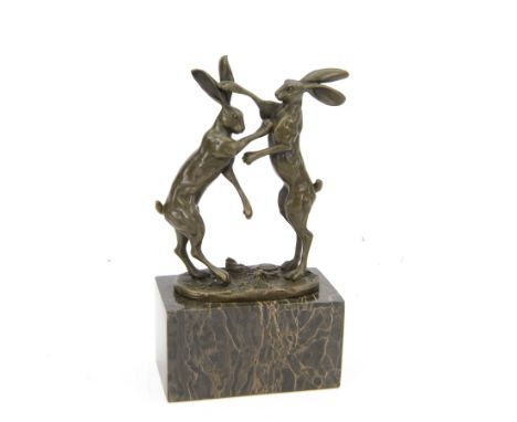 Bronze figure group, modelled as two male hares boxing, raised upon marble plinth base, with foundry mark, H24cm