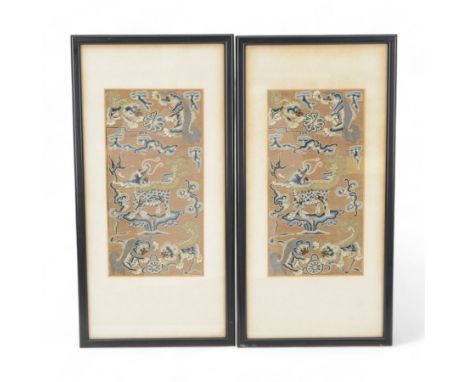 Pair of Japanese embroideries, depicting mythical animals amongst clouds in blue on a rose gold ground, in black glazed frame