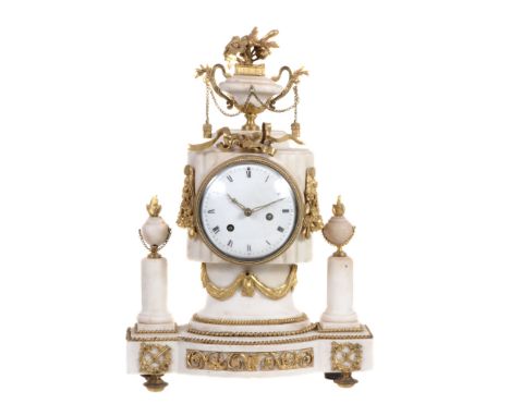 A French marble and ormolu mounted mantel clock, unsigned  A French marble and ormolu mounted mantel clock, unsigned,   first