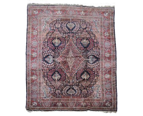 A Sarouk carpet , approximately 278cm x 390cm  A Sarouk carpet  , approximately 278cm x 390cm 