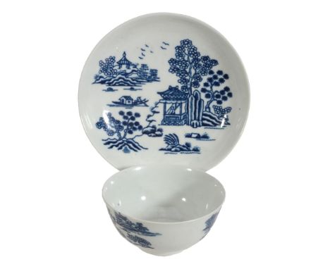 A Worcester blue and white printed large tea bowl and saucer, circa 1758  A Worcester blue and white printed large tea bowl a