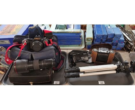 Assorted photographic equipment to include: Canon T50 35mm SLR camera outfit, including Sigma 400mm telephoto lens in its box