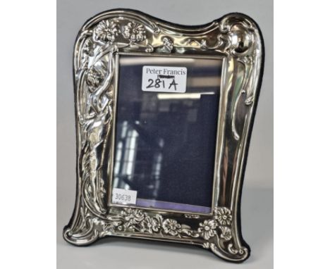 Modern silver Art Nouveau design easel picture frame, of semi-nude lady with organic flowers. Marked 925 Sheffield. Maker's m
