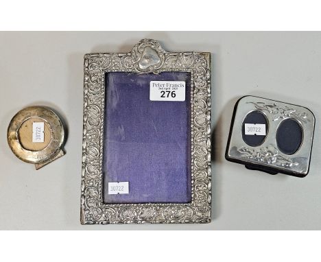 Edward VII silver embossed picture frame. Birmingham 1902. 20x14cm approx. Together with two other silver miniature picture f
