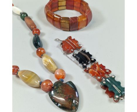 Collection of Scottish agate jewellery to include: bracelet, bangle and graduated and beaded necklace with shield shaped pend