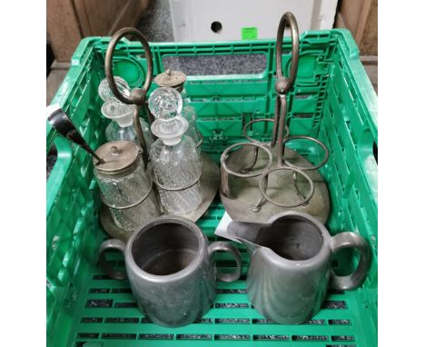 Pewter cream jug and two handled sucrier from Brown's Hotel Langharne (sic), together with a four piece cruet set and a cruet