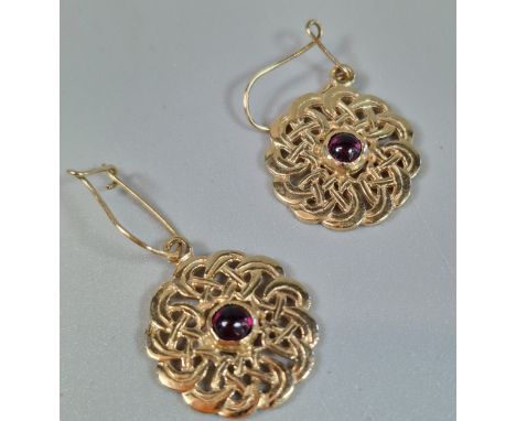 Pair of 9ct gold Celtic design earrings inset with red stones. 7.3g approx. (B.P. 21% + VAT)