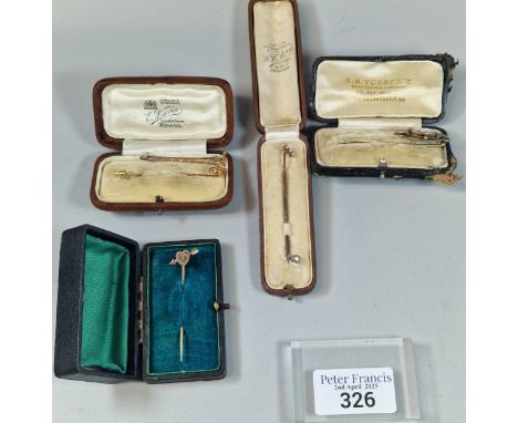 Collection of cased Edwardian/Victorian stock pins, some gold and in the form of a riding crop, cameo portrait, heart and arr