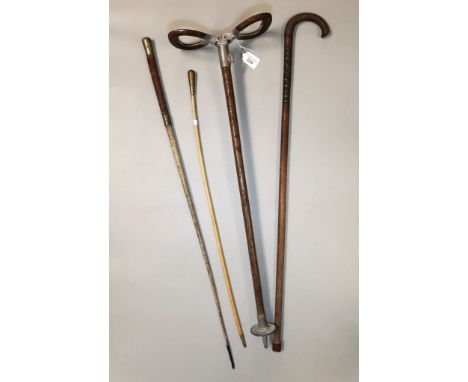 Vintage shooting stick, together with a vintage walking cane and two Military swagger sticks, one marked Royal Army Service C