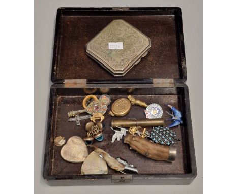 Japanese lacquered box revealing assorted items to include: silver plated engraved cigarette case, turtle brooch, silver ster