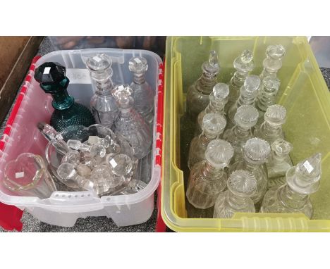 Two plastic boxes comprising a collection of various decanters and stoppers ,together with a two handled glass centre bowl, v