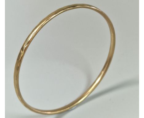 9ct gold bangle. 3.3g approx. (B.P. 21% + VAT).&nbsp;Weight as per description (3.3g approx.) Quite badly dented and misshape