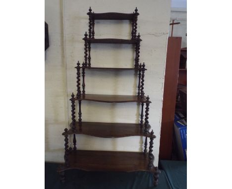 A Victorian Rosewood Six Shelf Whatnot with Barley Twist Supports. 