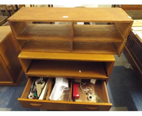 A Cabinet with Single Drawer and A Pull Out Slide Together with A Shelf Unit. 