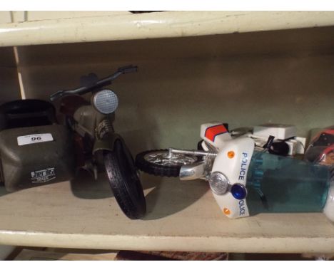 A Cherilea Motorcycle and Side Cart and A Police Motorcycle with Action Man Figure. 