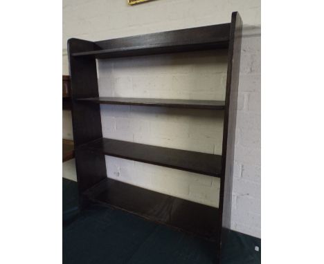 An Oak Four Shelf Open Waterfall Book Case. 