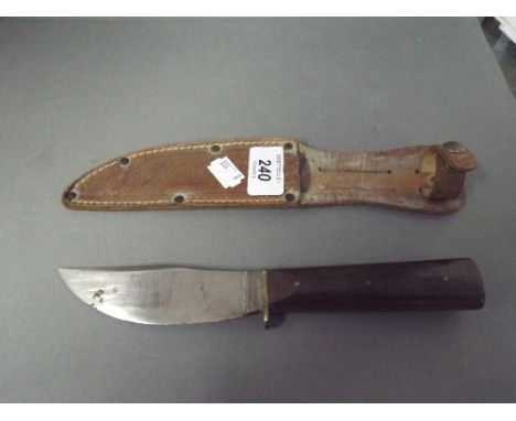 A German Hunting Knife in Scabbard. 