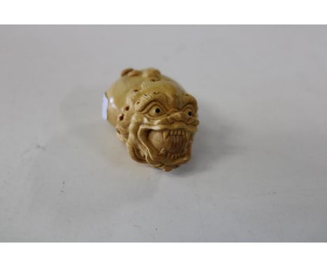 A Chinese box wood netsuke 