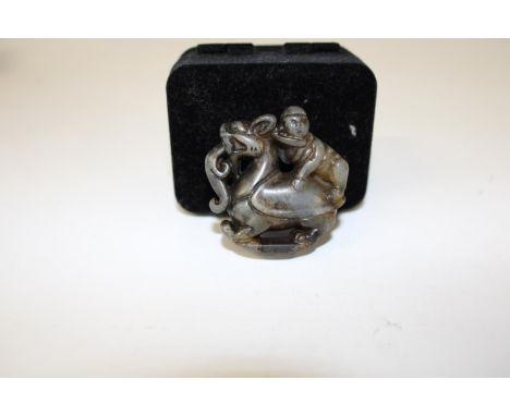 A Oriental carved jade amulet 5cm 