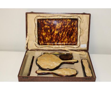 A vintage cased tortoise shell effect Ladies dressing table set 