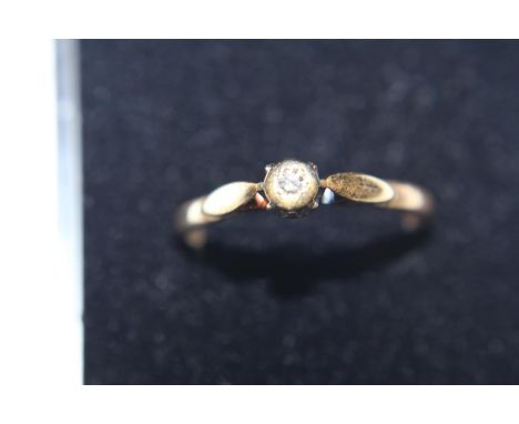 A 18ct gold diamond solitaire ring size O 1/2 