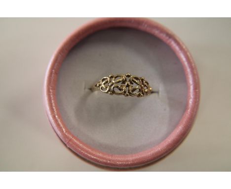 A 9ct gold ornate patterned ring size Q 