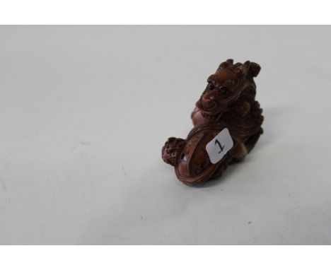 A Chinese box wood netsuke 