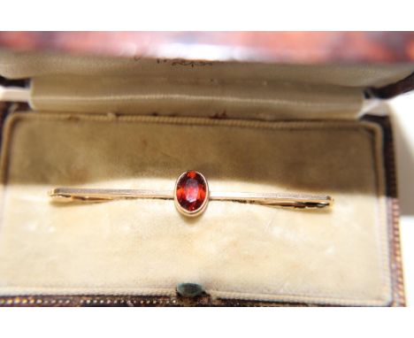 A vintage 9ct gold &amp; Hessonite Garnet tie pin/brooch 