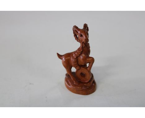 A Chinese box wood netsuke 