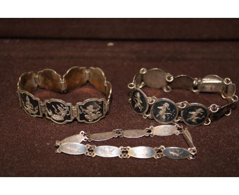 Four vintage 925 silver Siamese bracelets 