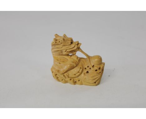 A Chinese box wood netsuke 
