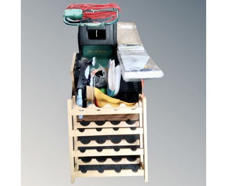 A wine rack together with a qualcast electric lawnmower, miniature work bench, garden netting, together with a pack of underl