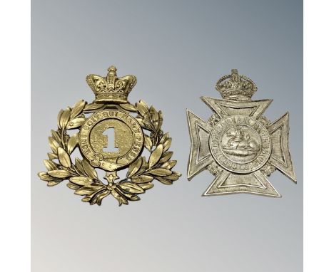 Two Edwardian helmet plates, 1st foot and Kaffrarian rifles