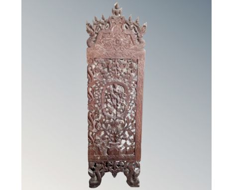 An Asian carved hardwood frieze panel.
