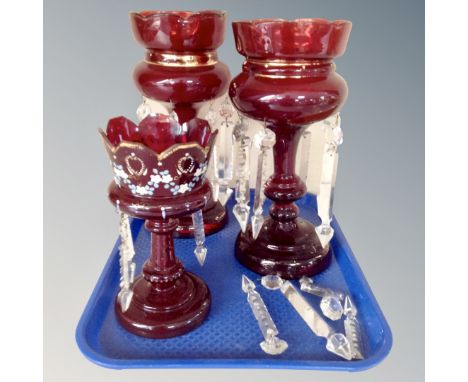Three 19th century ruby glass lustres with crystal drops 