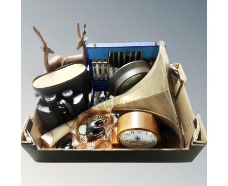 A box containing of miscellaneous to include carnival glass bowl, canteen of cutlery, contemporary mantel clock, wooden carvi