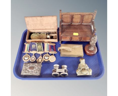 A tray of cased opium scales, oak table box in the form of a settle, Freemason's medals on ribbons, brass Buddha etc 