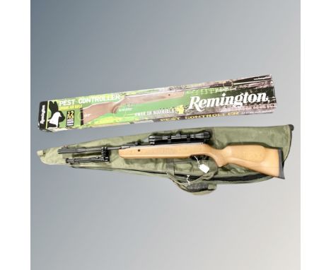 A Remington Pest Controller .22 air rifle with scope, adjustable fibre optic sight, sound moderator and bipod, with original 