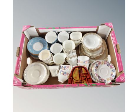 A crate of part English china tea services, Poole dish etc 
