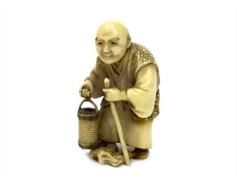 EARLY 20TH CENTURY JAPANESE IVORY NETSUKE, in the form of an elderly man with walking stick and lantern, signed, 5cm high