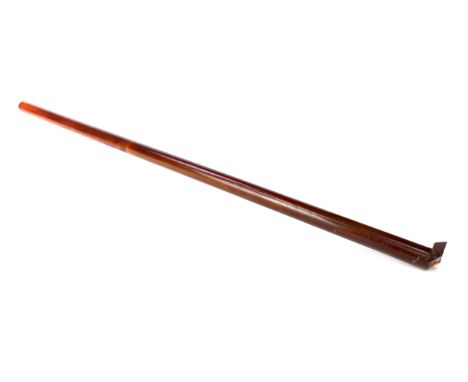 EARLY 20TH CENTURY BAKELITE CYLINDRICAL STICK, 50cm long