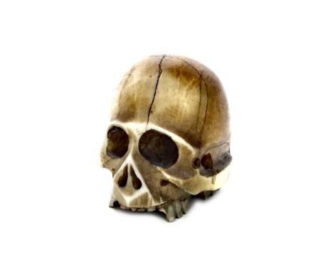 EARLY 20TH CENTURY JAPANESE IVORY SKULL NETSUKE, 3.4cm high