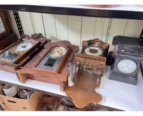 Two slate mantel clocks, two Gingerbread clocks and wall clock.